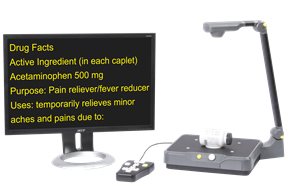 Eye-Pal Vision scanning and reading appliance showing magnified pill bottle instructions on a monitor.